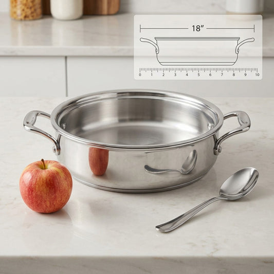 Tramontina Signature 3 Qt Braiser shown beside an apple and spoon for size reference.