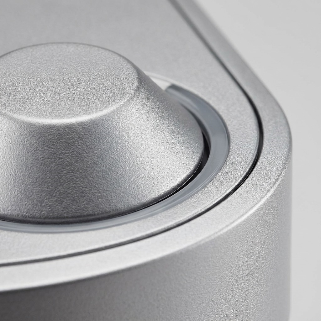 Keurig K-Suite Hospitality Coffee Maker metallic finish and button close-up