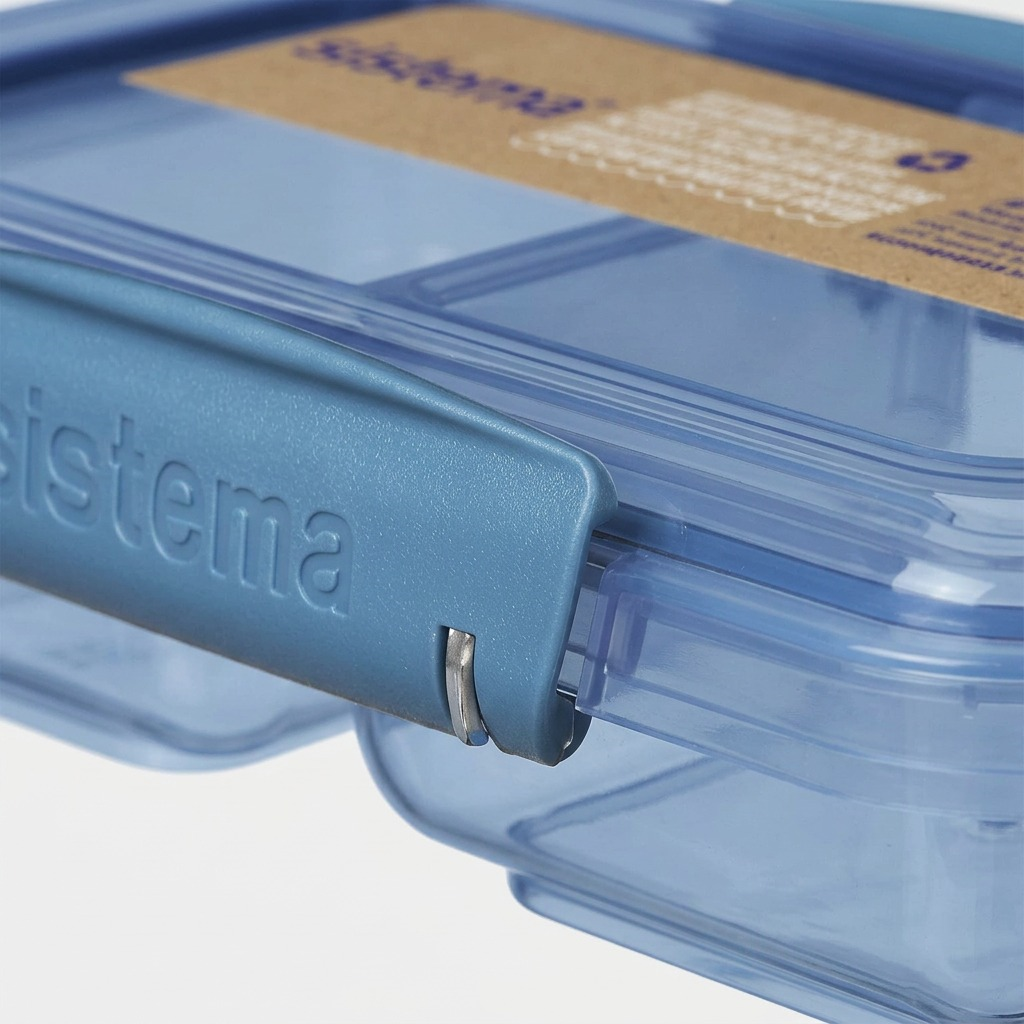Extreme close-up of the Sistema Ocean Bound Plastic hinge, showing the metallic split pin and plastic texture.