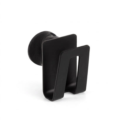 A professional front-angled product shot of the black Happy Sinks bio composite sponge holder against a pure white background.