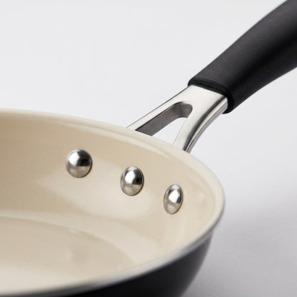 Tramontina Gourmet Ceramica Deluxe 10-Inch Fry Pan handle rivet close-up
