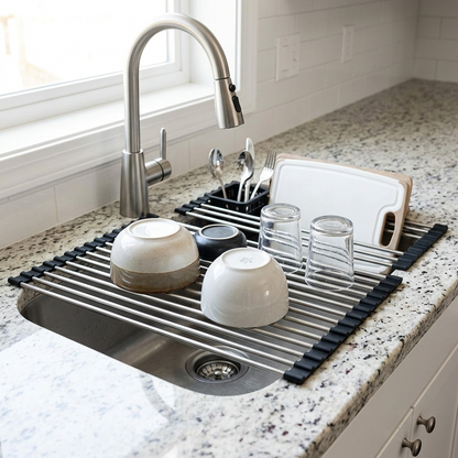 Lifestyle image showing the Happy Sinks drying rack across an in-counter sink, holding freshly washed items.