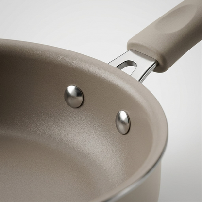 Tramontina 6-Piece Nesting Ceramic Cookware Set Petit-Eco White ceramic finish and rivet close-up