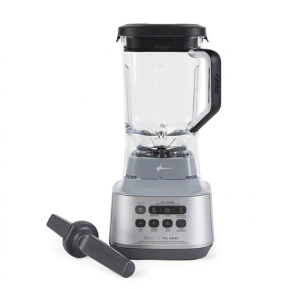 Oster 2186673 XL Pro Series Blender with 9-cup Tritan jar, silver base, and tamper on white background.