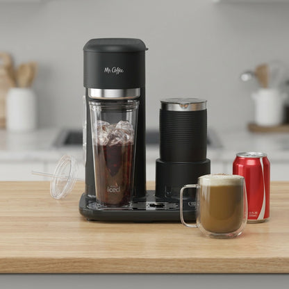 Mr. Coffee 4-in-1 Coffee Maker shown for scale on a wooden counter next to a 12oz soda can.