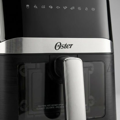 Macro detail of Oster 4-Quart Air Fryer showing digital presets, steel trim, and viewing window.