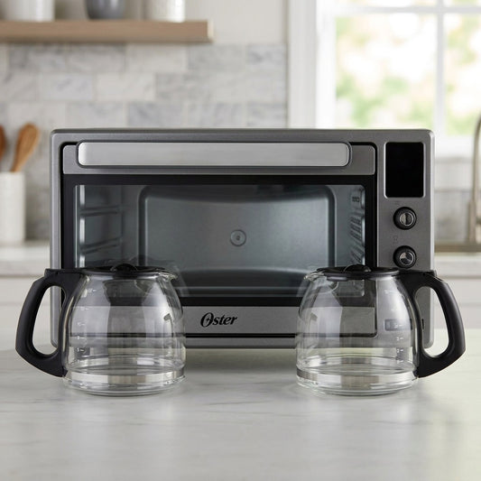 Scale reference of the Oster 2210052 Digital Air Fryer Toaster Oven shown with two coffee carafes.