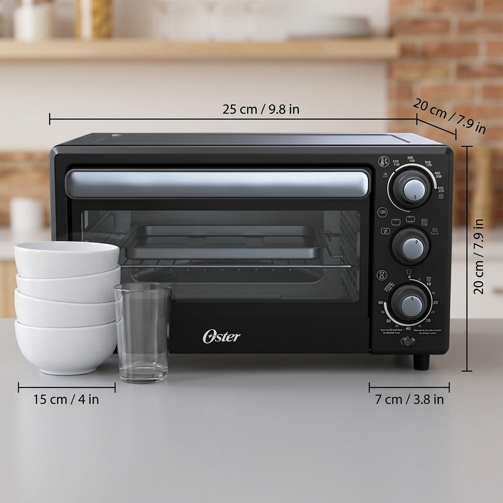 Black Oster Compact Air Fryer Oven with dimension lines shown next to a stack of bowls for scale.