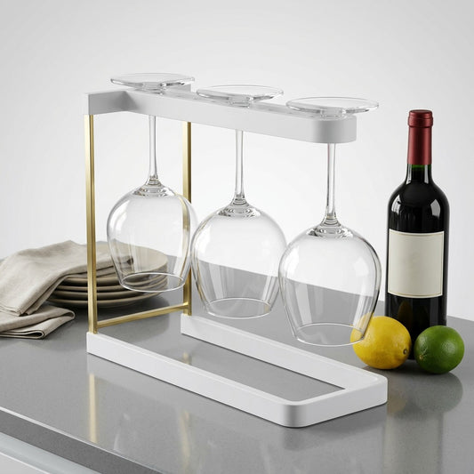 Happy Sinks Wine Glass Rack white bio-composite scale reference with wine bottle on countertop
